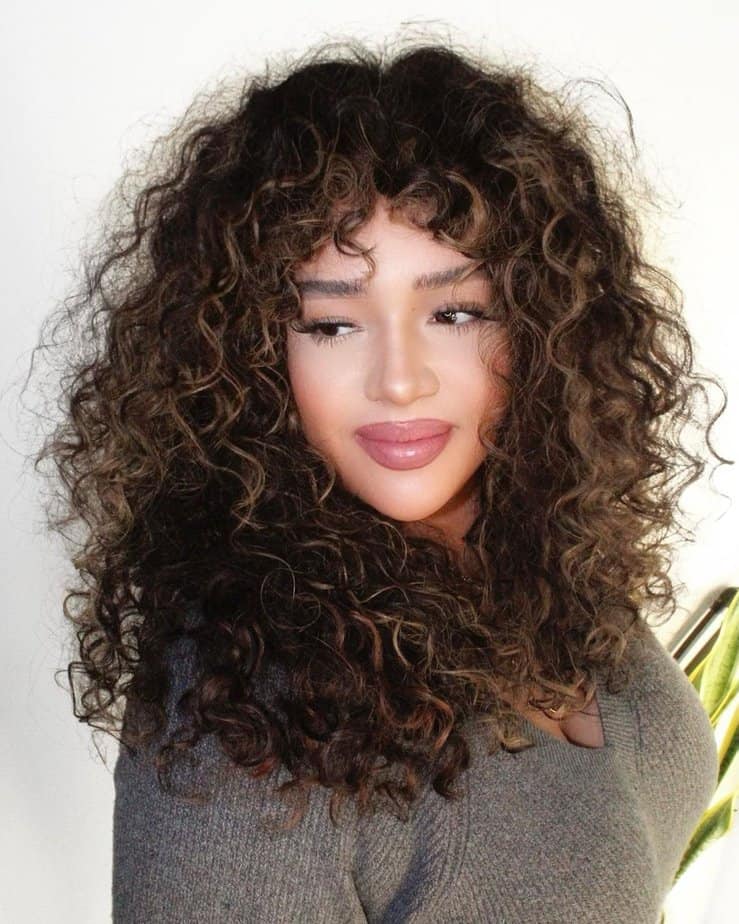 2. Bouncy volume with textured bangs