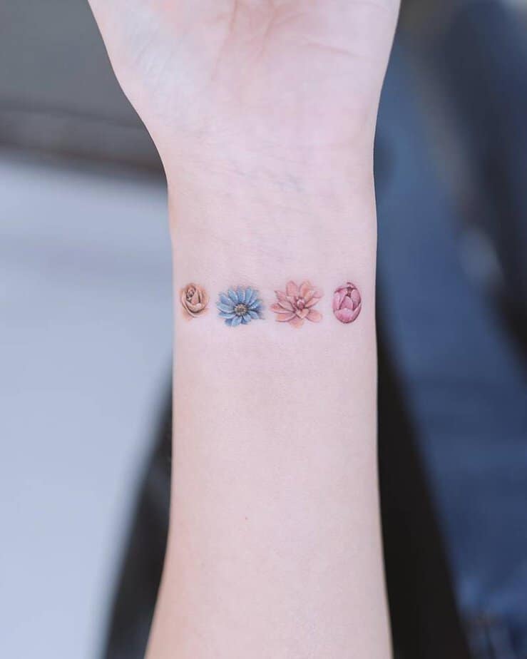 20 Adorable Flower Wrist Tattoo Ideas That Will Grow On You