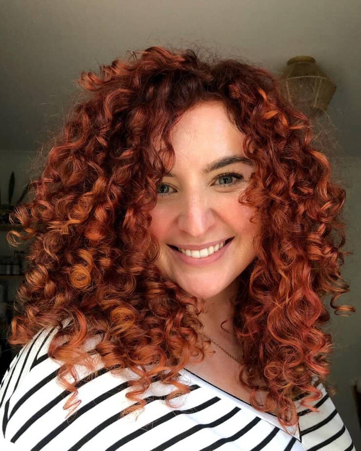 34. Fiery red curls with bold definition