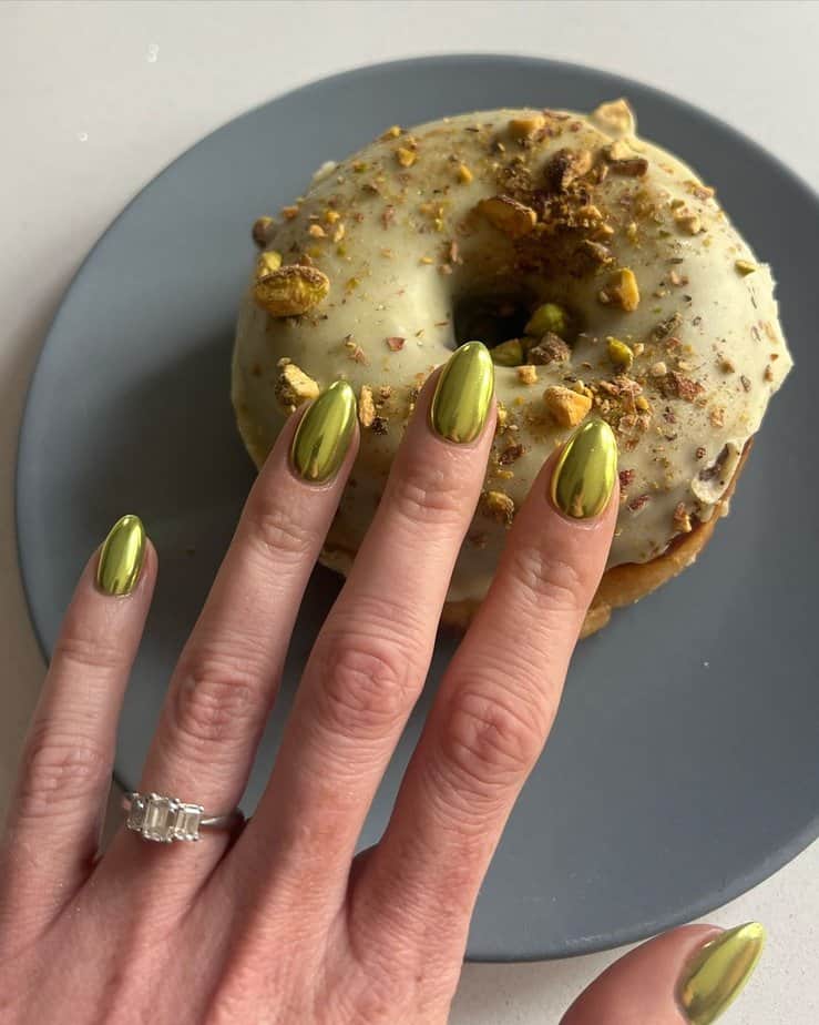 34. Pistachio green chrome nails