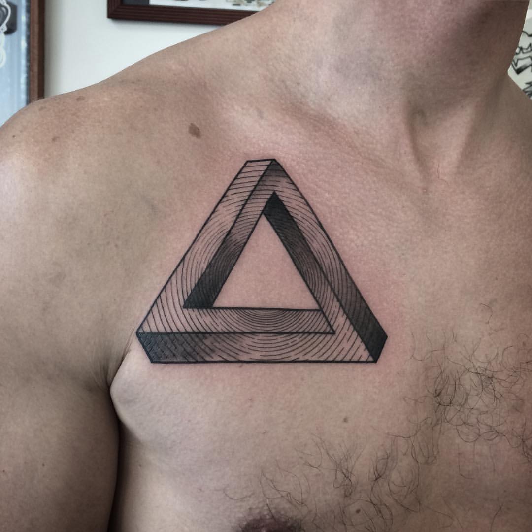 6. Textured Penrose triangle on the chest