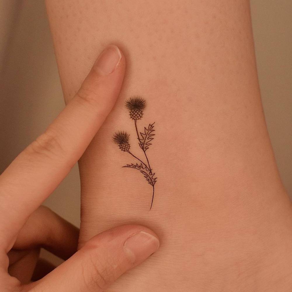 20 Amazing Thistle Tattoo Ideas That Show There Is Beauty In The Thorns