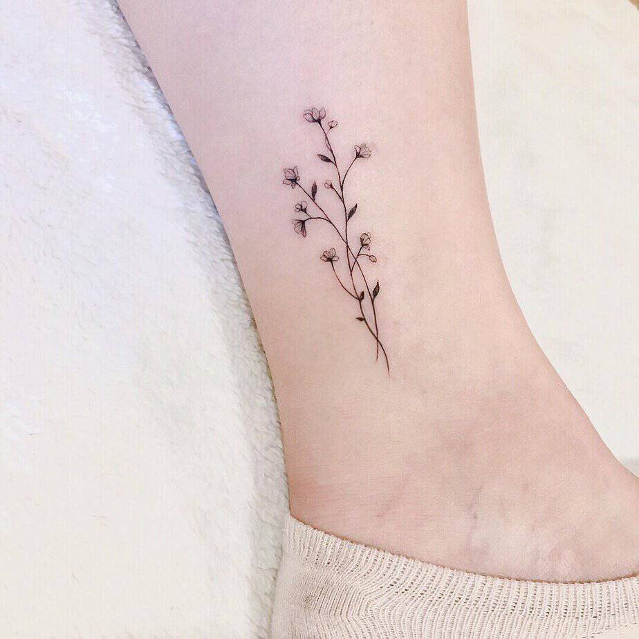 Babys breath tattoo on the ankle