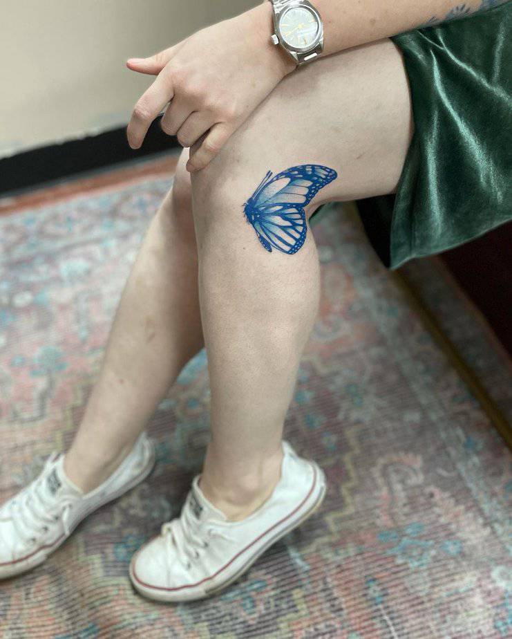 Blue butterfly tattoo