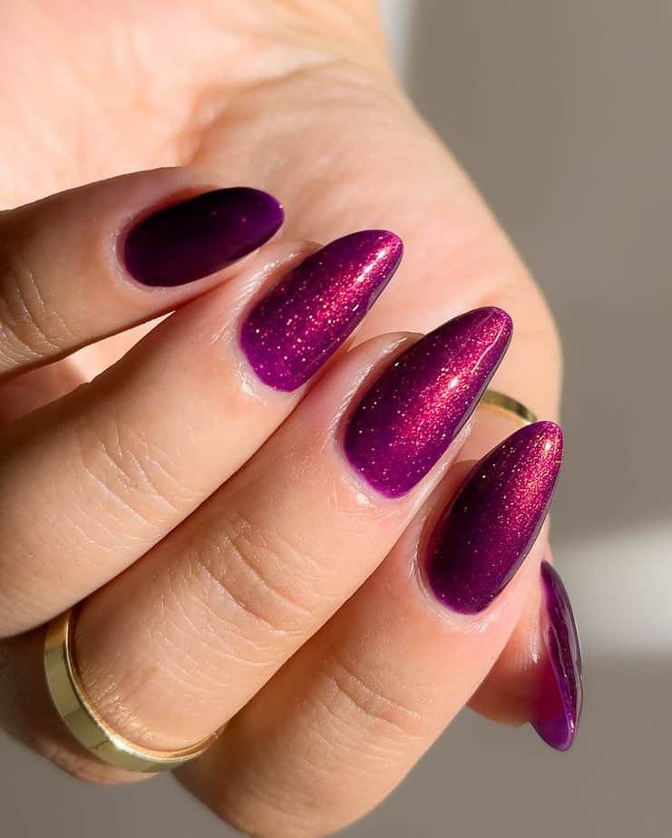 Magenta cat eye nails