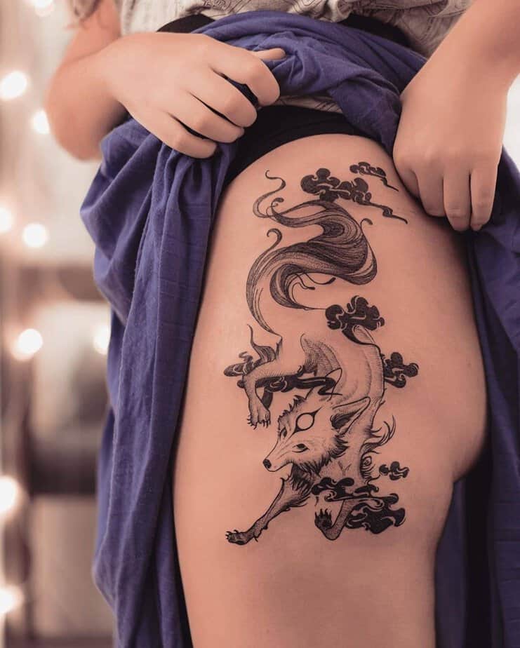 Okami tattoo on the hip