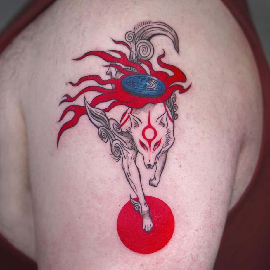 Okami tattoo on the shoulder