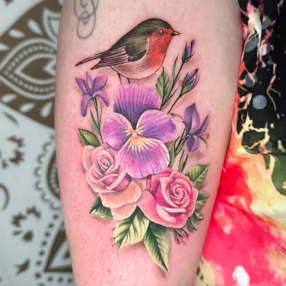 Robin among roses