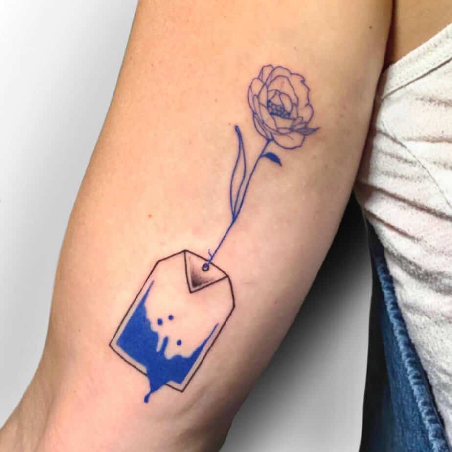 18 Unique Blue Rose Tattoos That Are Blooming Brilliant 