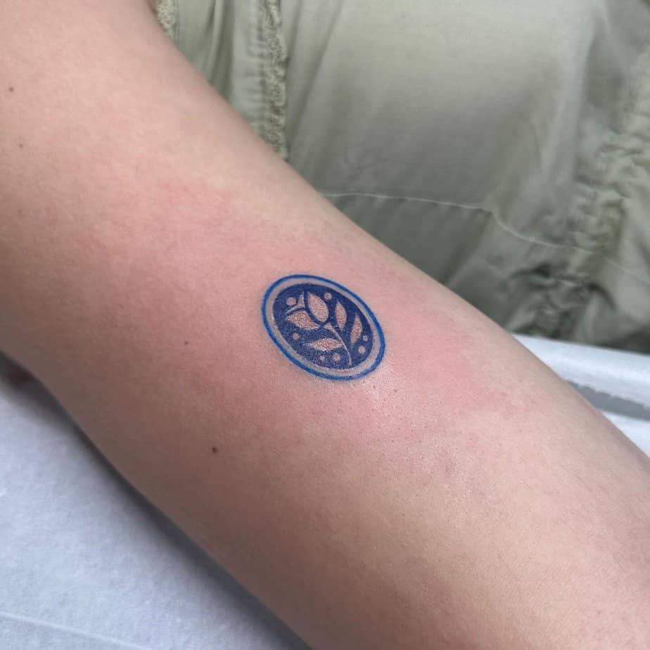 18 Unique Blue Rose Tattoos That Are Blooming Brilliant 