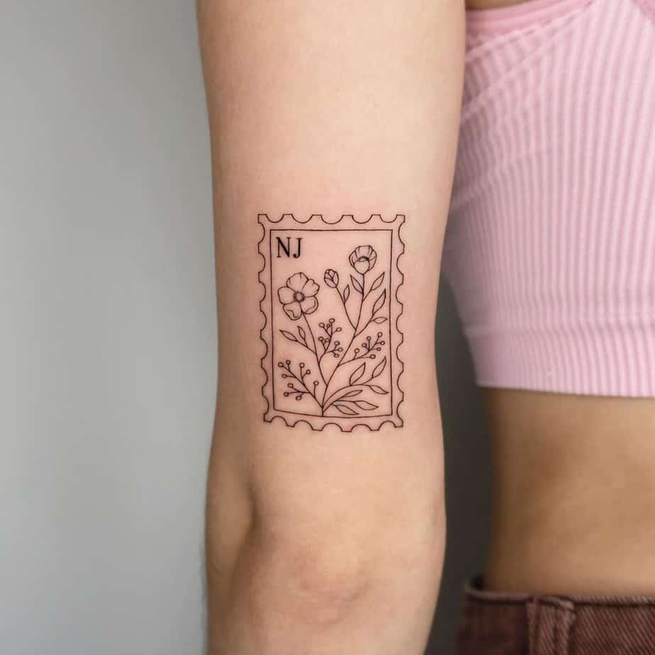 20 Lighthearted Stamp Tattoo Ideas For All The Dreamers Out There