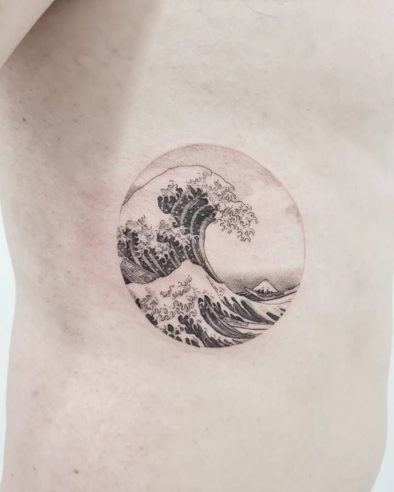 Wave circle tattoo