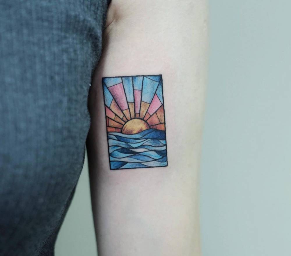 20 Stained Glass Tattoos That Will Brighten Your Day