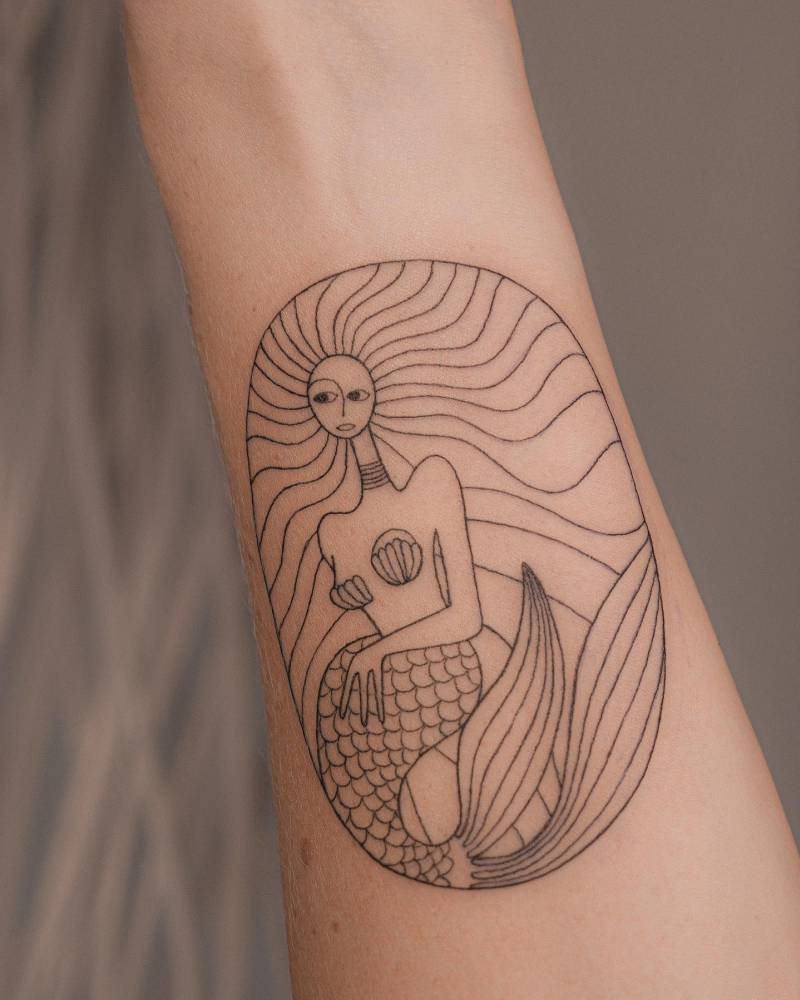 10. Amazing abstract siren tattoo