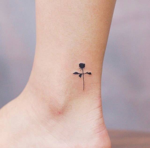 10. Mini black rose on the ankle