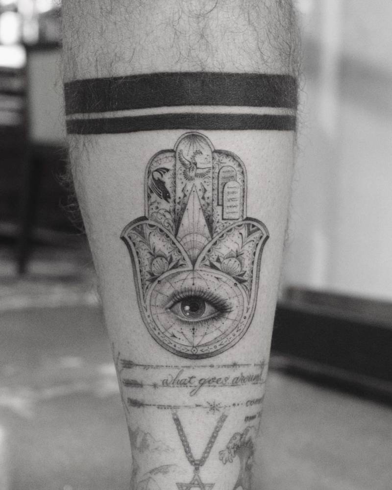 12. Detailed hamsa with cosmic vibes