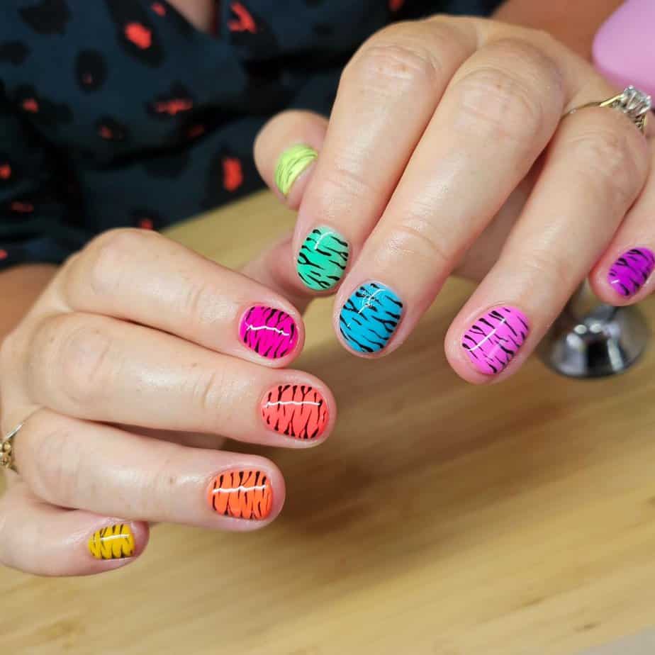 12. Multicolored zebra print on short nails