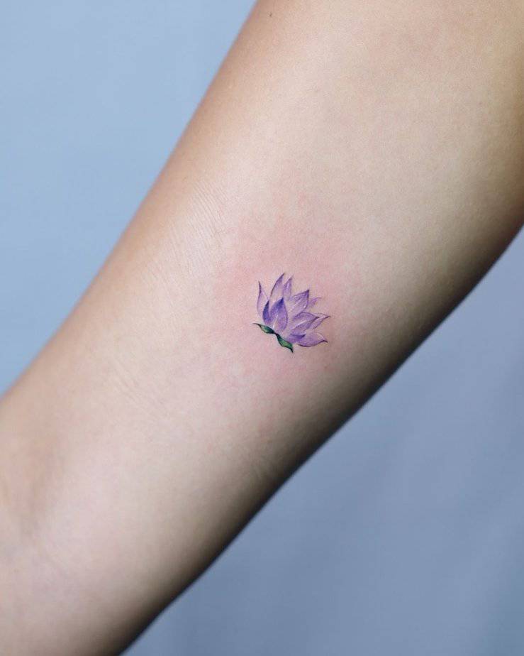 12. Petite lotus on the forearm