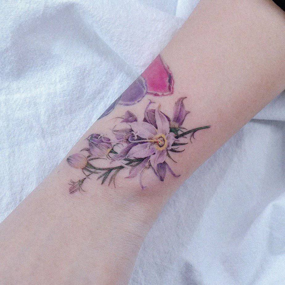 20 Absolutely Gorgeous Purple Flower Tattoo Ideas