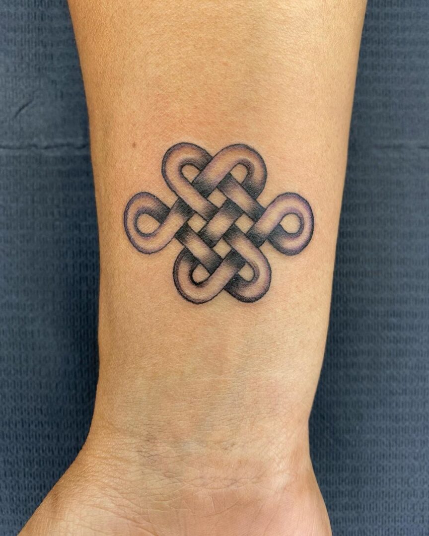 Get Tangled In These 20 Incredible Celtic Knot Tattoos