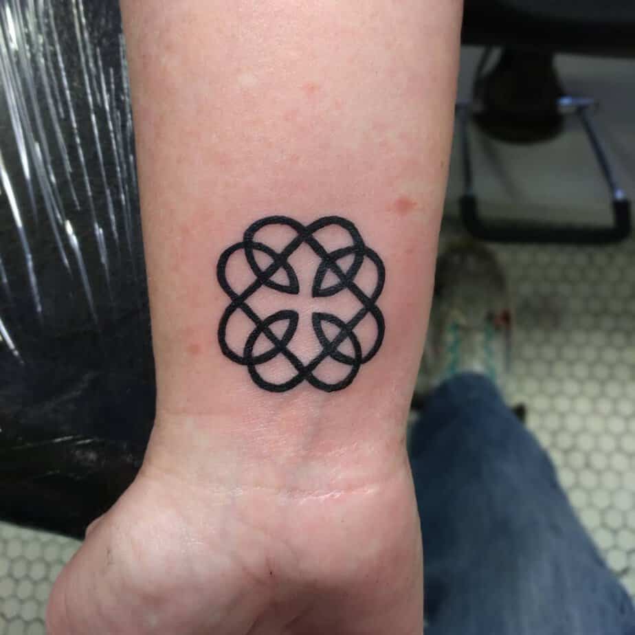 14. Simple Celtic knot tattoo