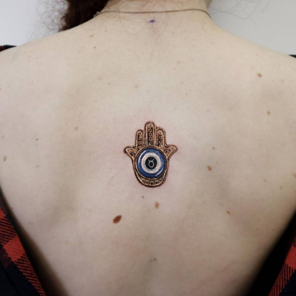 20 Hamsa Hand Tattoo Designs That Have The Magic Touch