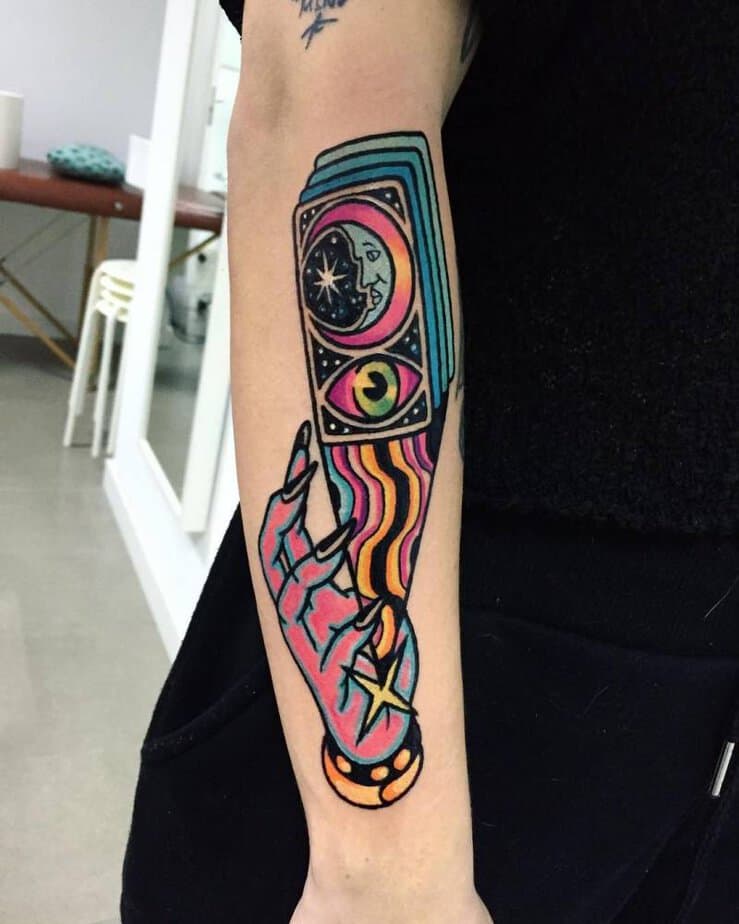 16. Neon moon tarot tattoo