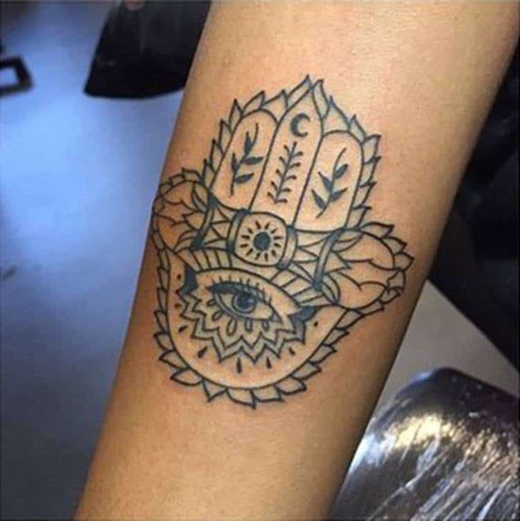 18. Bold hamsa hand with traditional details