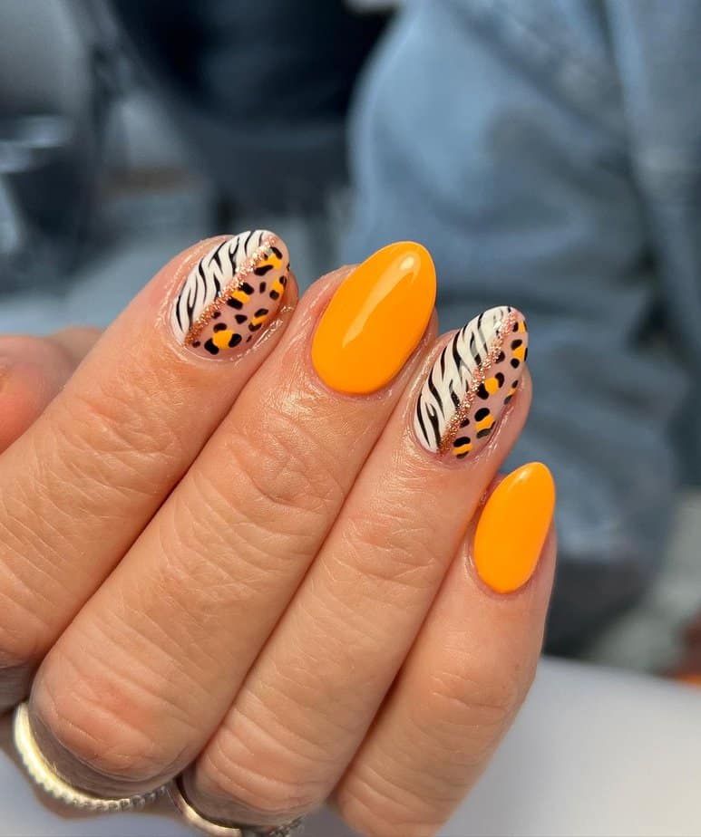 2. Bold orange with zebra and leopard combo