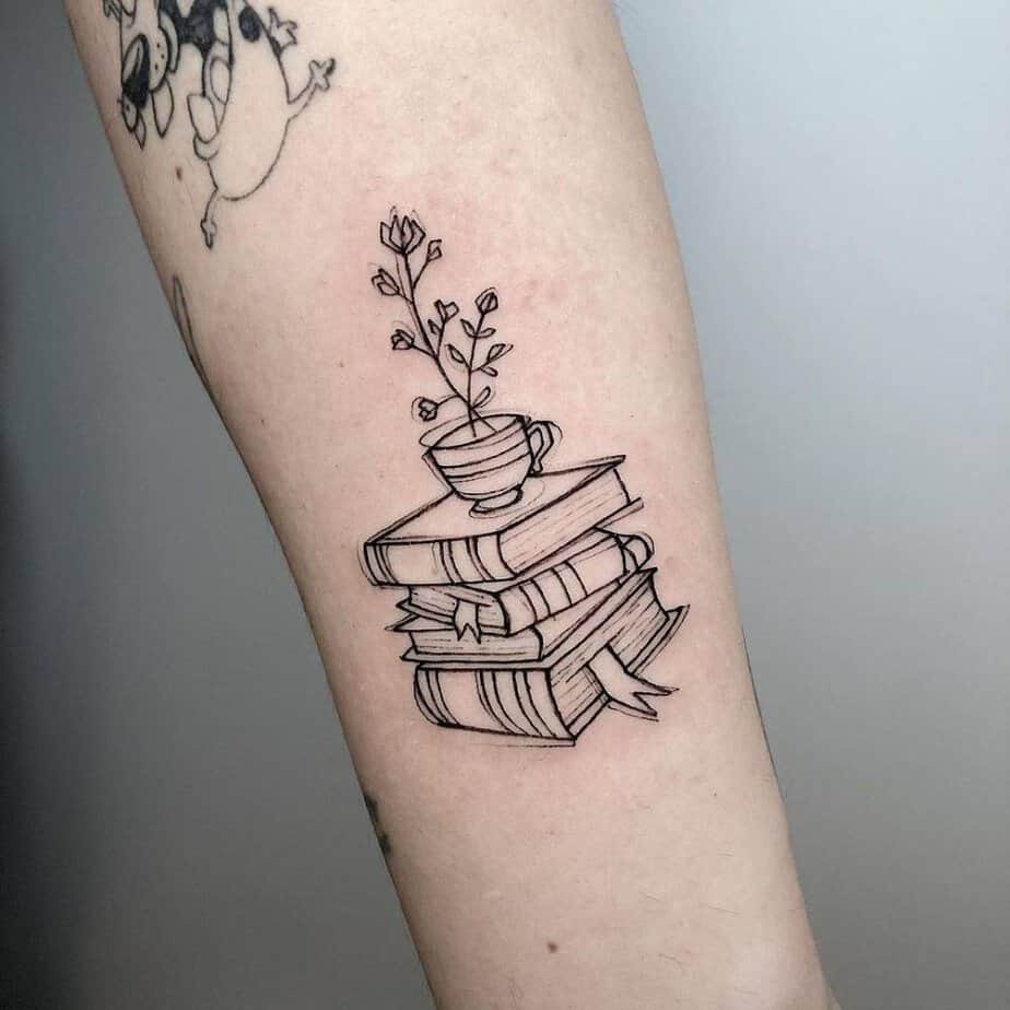 2. Cozy stack of books with a flower