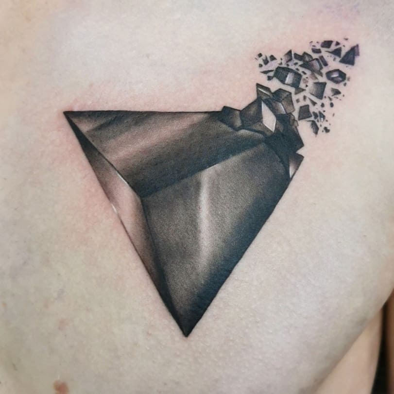 20. Exploding pyramid tattoo