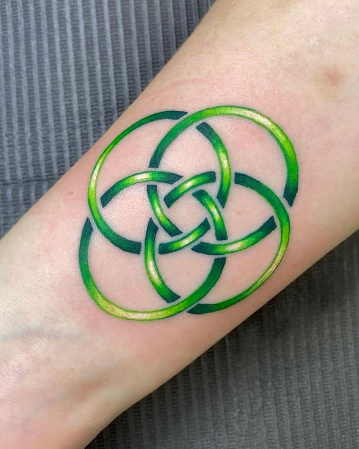 20. Green endless knot tattoo