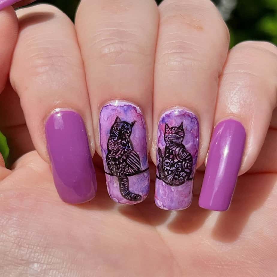 22. Purple cats with intricate patterns