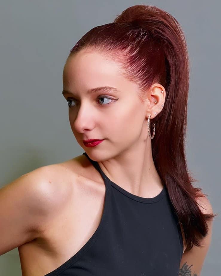 26. Bold and fiery red ponytail