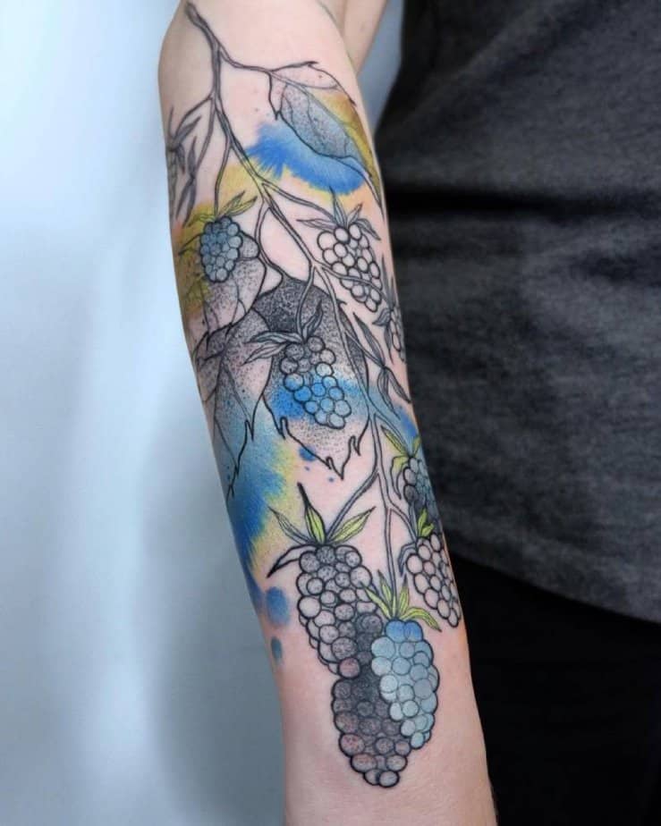 4. Watercolor blackberry branch tattoo