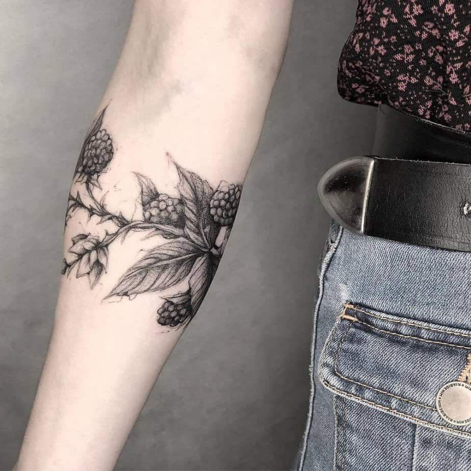 6. Black and gray blackberry branch tattoo