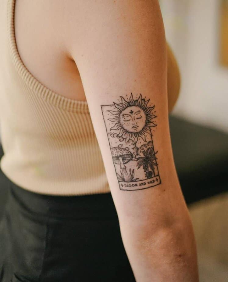 6. Sun tarot tattoo bloom and wild