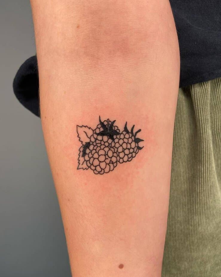 8. Simple blackberry cluster tattoo