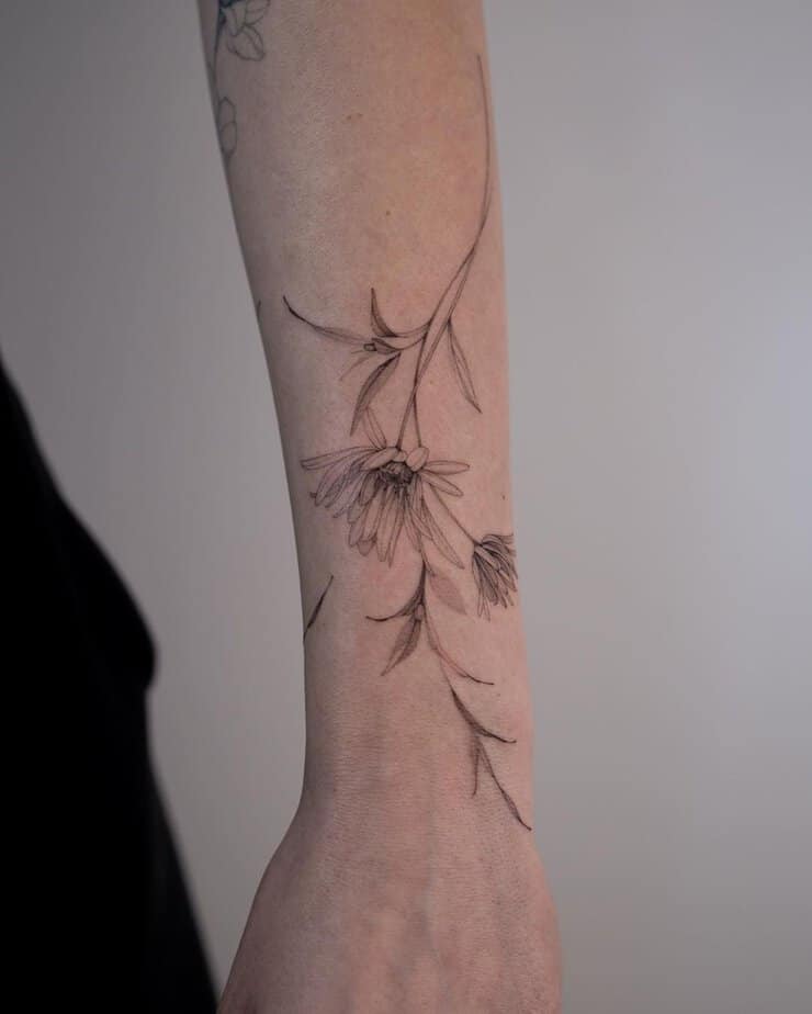 Black and gray aster tattoo