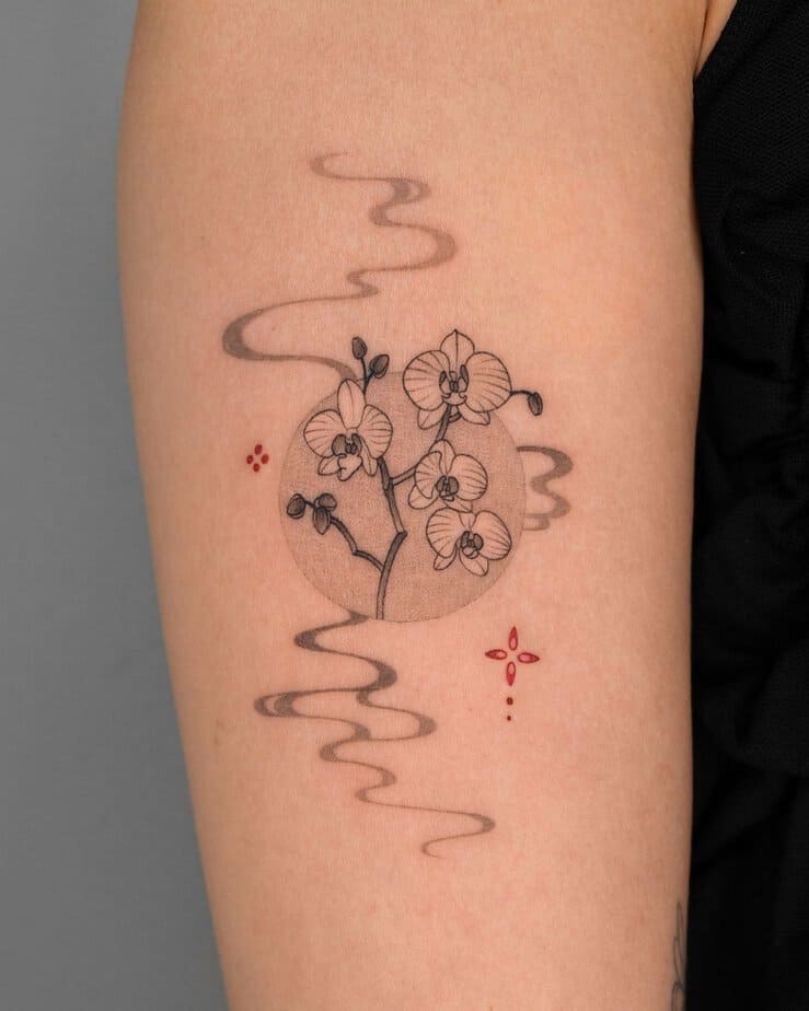 Black and gray orchid tattoo