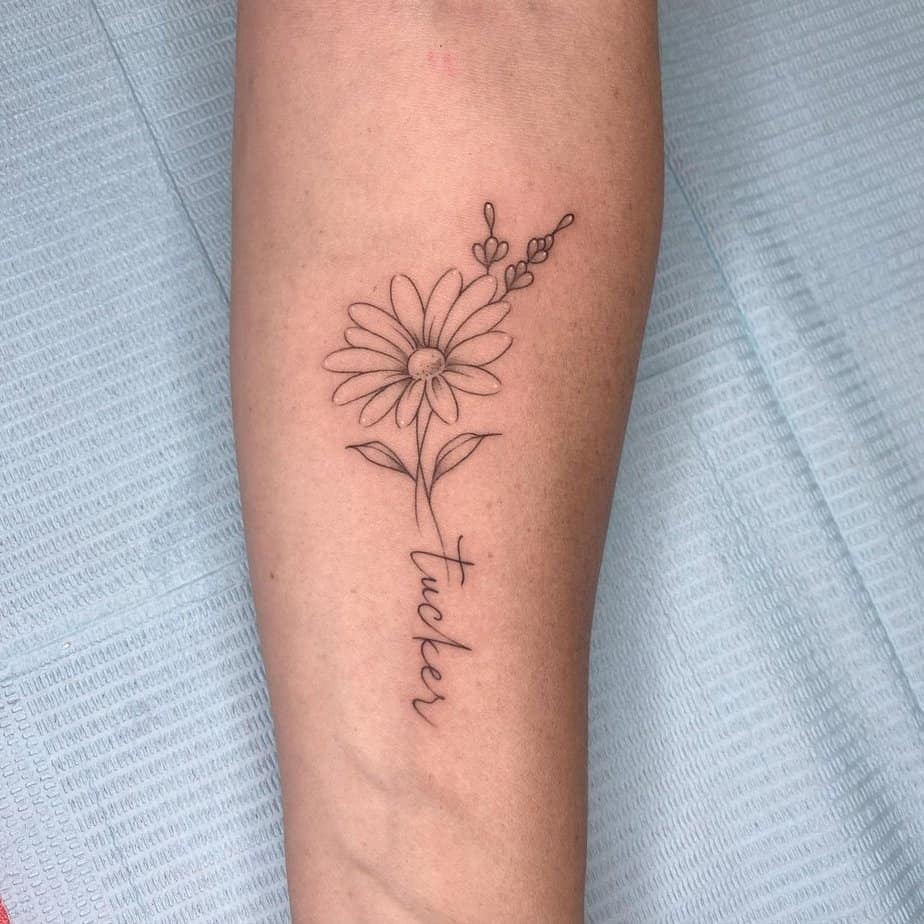 Daisy tattoo with lettering