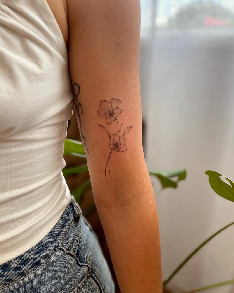 18 Empowering February Birth Flower Tattoos To Adorn Your Skin