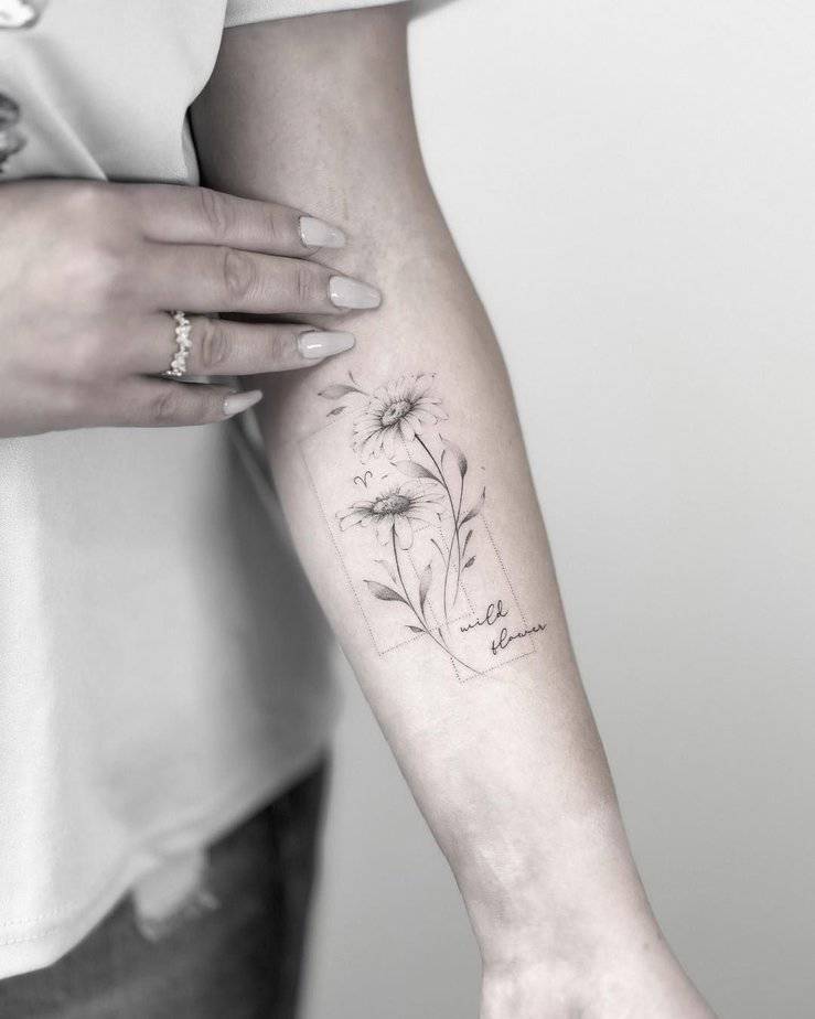 Inspiring daisy tattoo