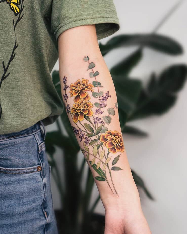 18 Charming Marigold Tattoos To Look Like A Ray Of Sunshine