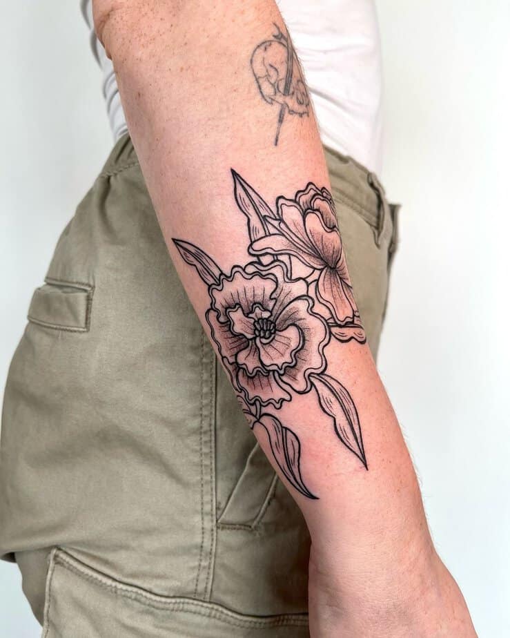 Marigold tattoo on the forearm