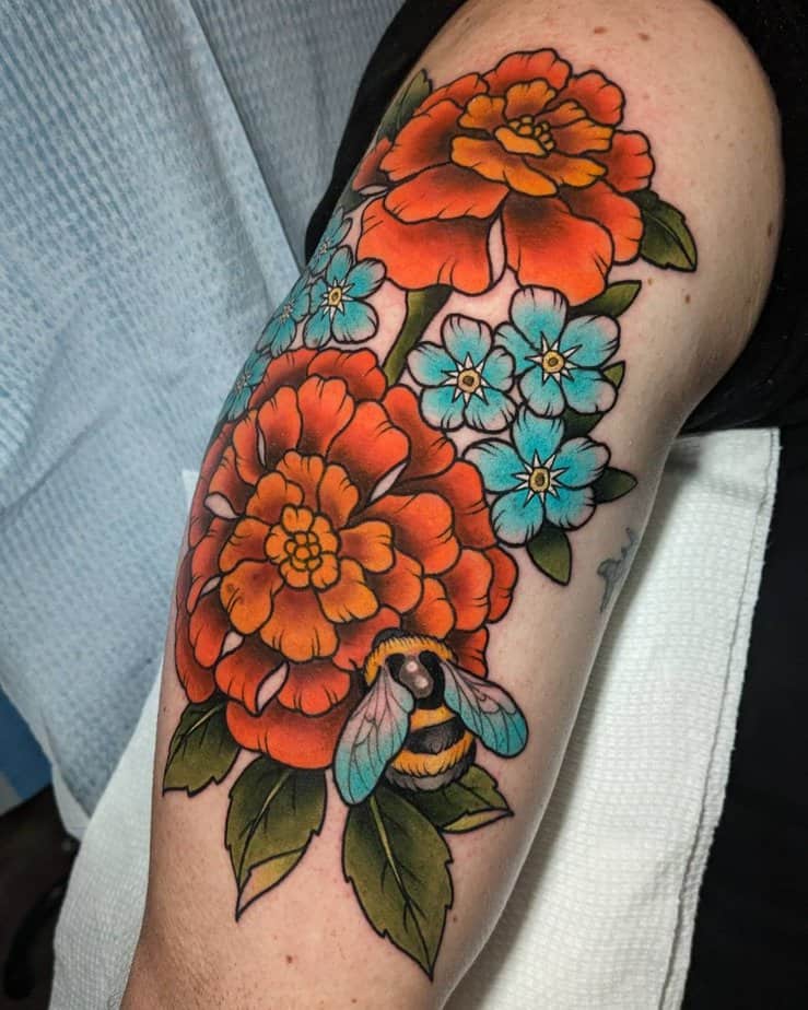 18 Charming Marigold Tattoos To Look Like A Ray Of Sunshine