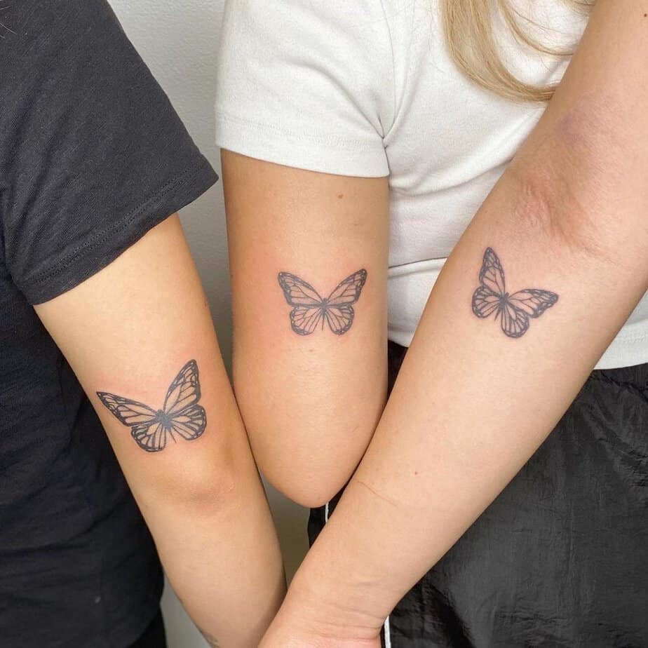 Matching monarch butterfly tattoos