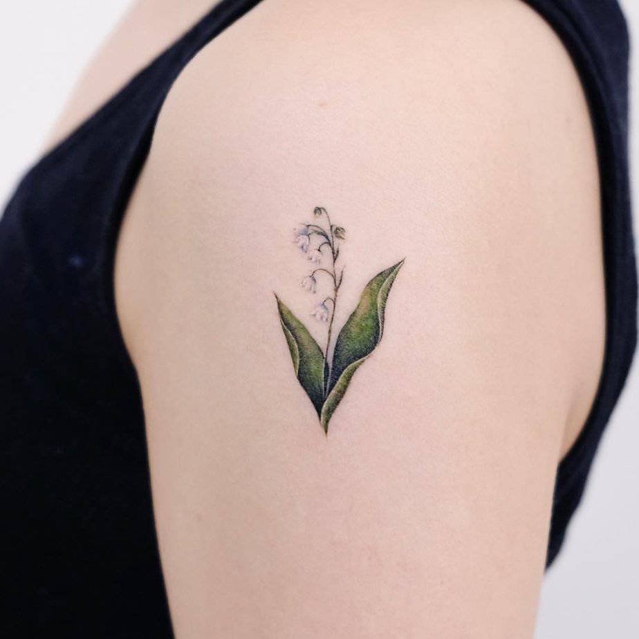 Micro lily of the valley tattoo