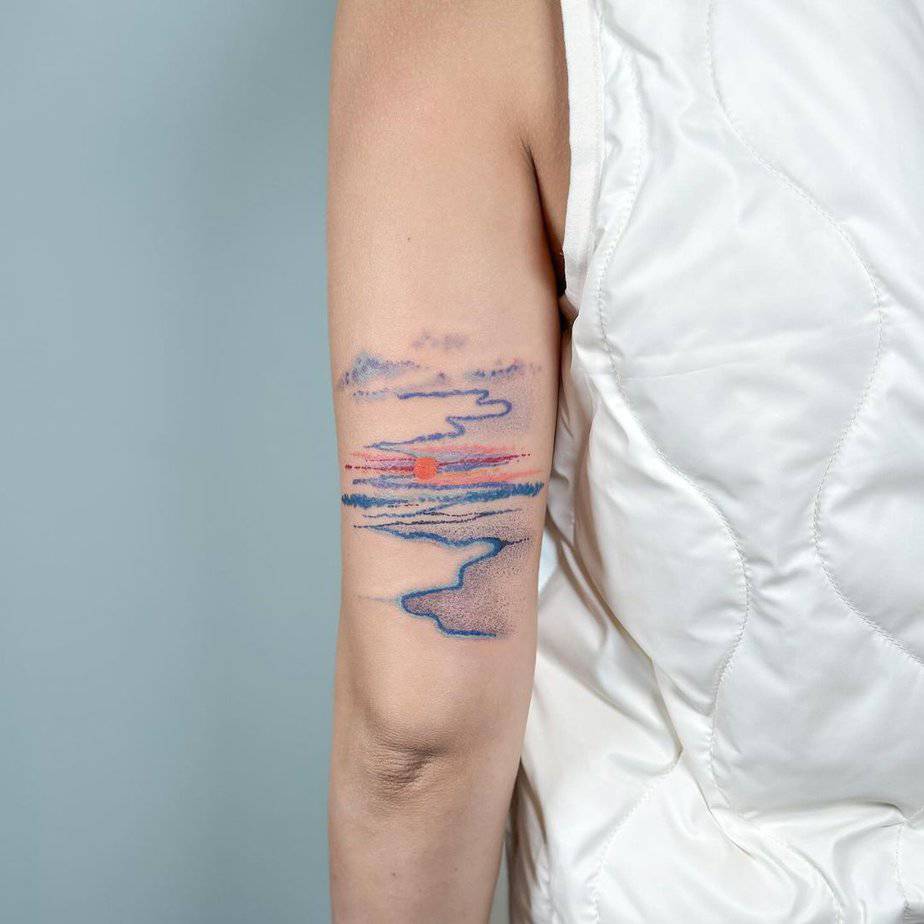 Sea and sky tattoo