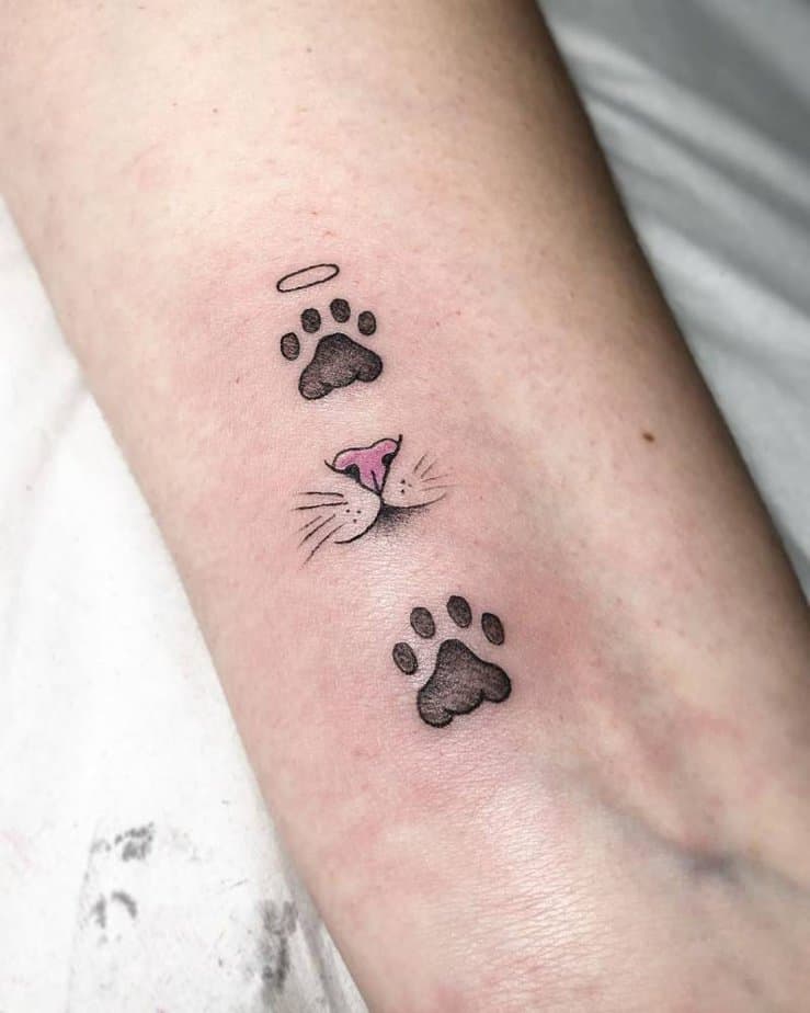 18 Charming Cat Paw Tattoos That Will Make You Say "Meow"